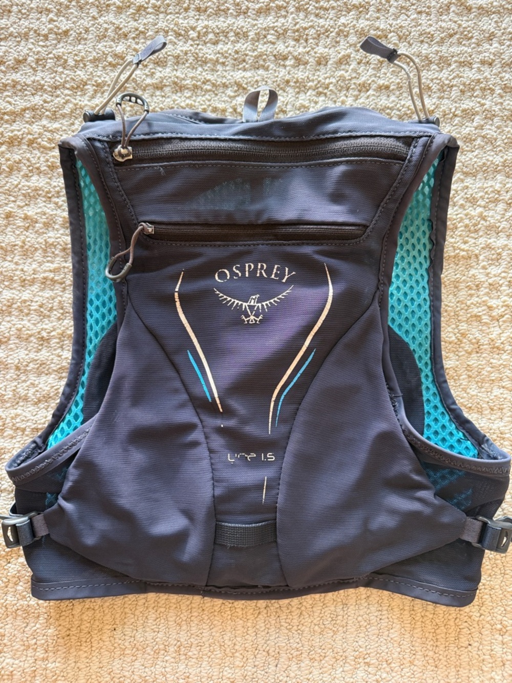 OSPREY Dyna Black Hydration Vest with Teal Mesh Accents